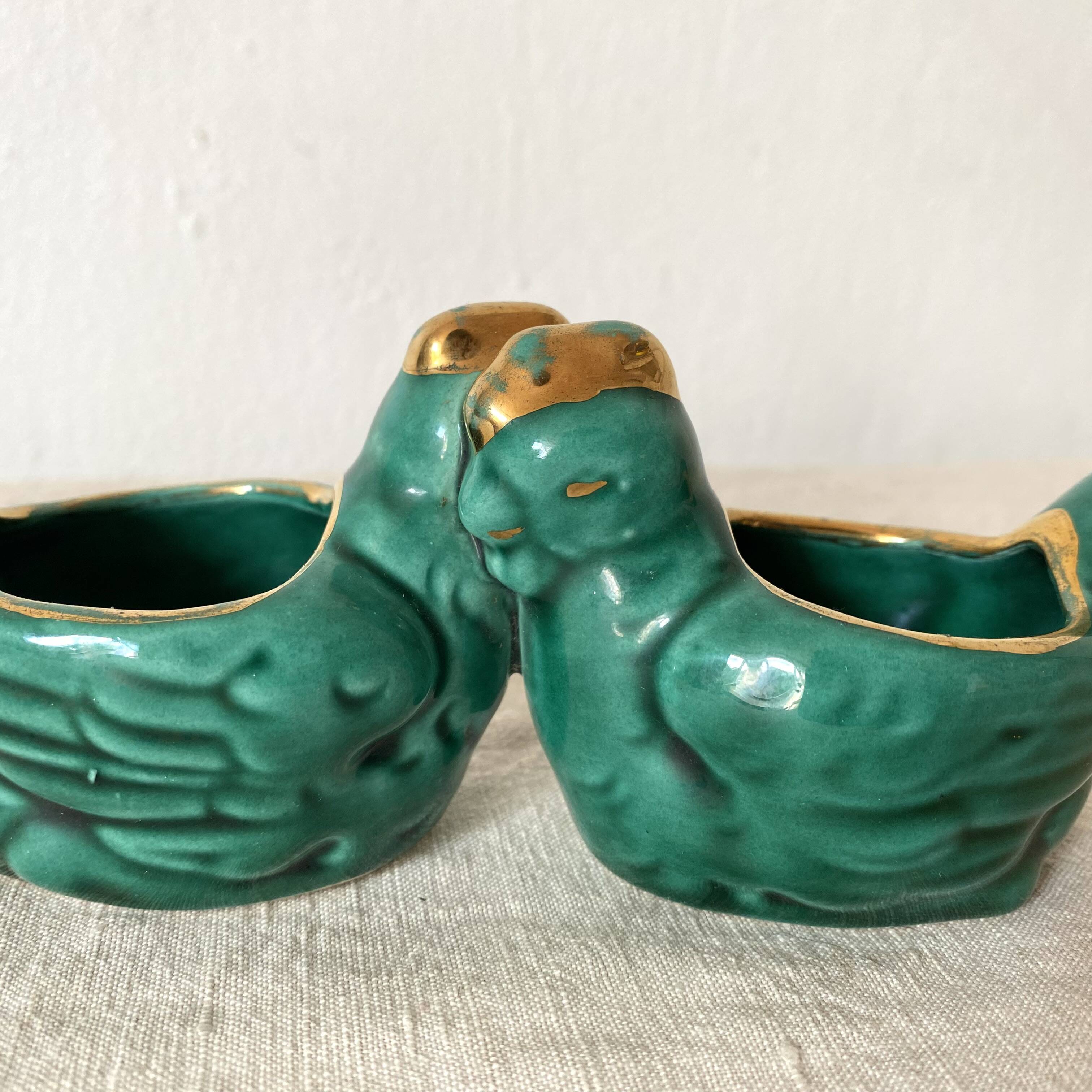 Salt and pepper shakers with chickens in slip