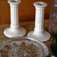 Pair of cream ceramic candlesticks