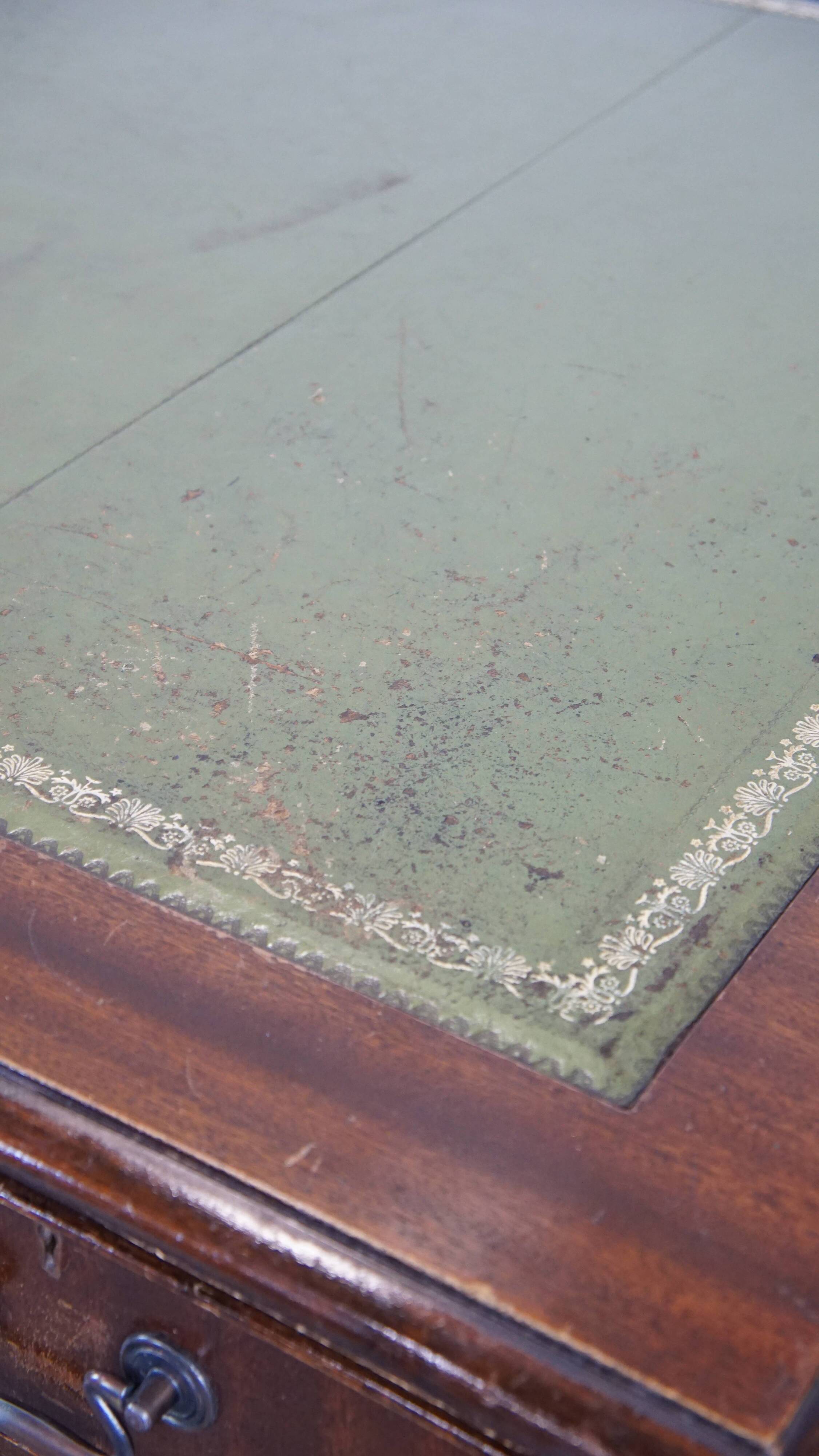 English style chesterfield desk with patina and a green leather top