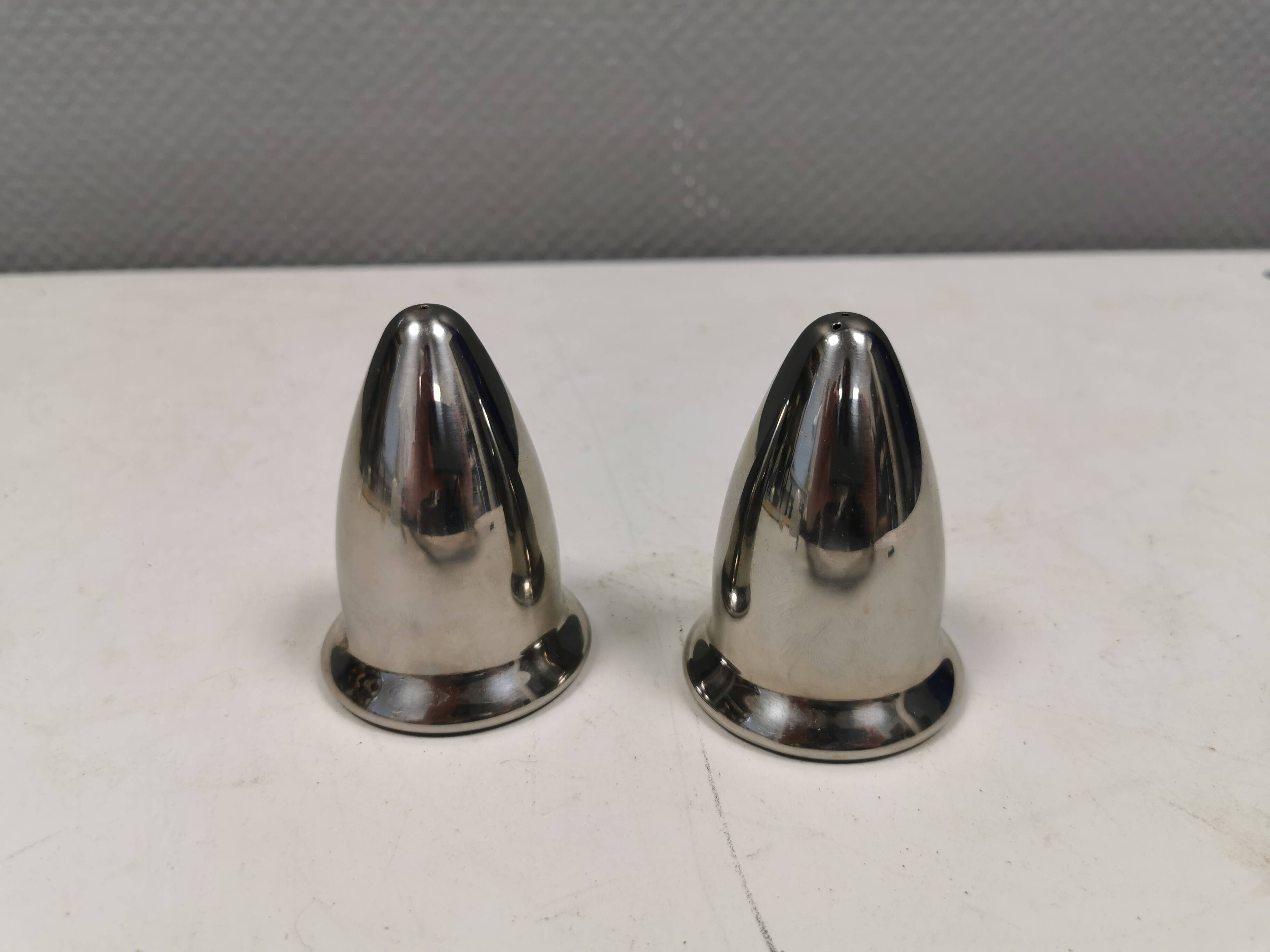 A beautiful stainless steel salt and pepper set, space age style 1980s.