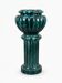 Large cache-pot on a ceramic column – In the style of Clément