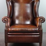 Luxurious large sheep leather wingback armchair with beautiful colors and amazing patina