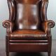 Luxurious large sheep leather wingback armchair with beautiful colors and amazing patina