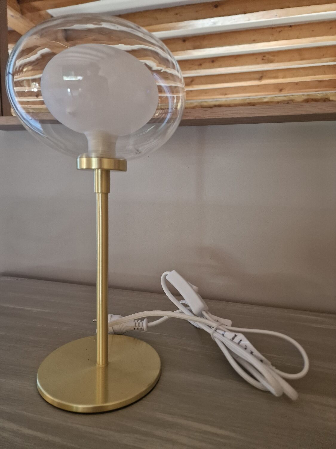 Glass and brass lamp