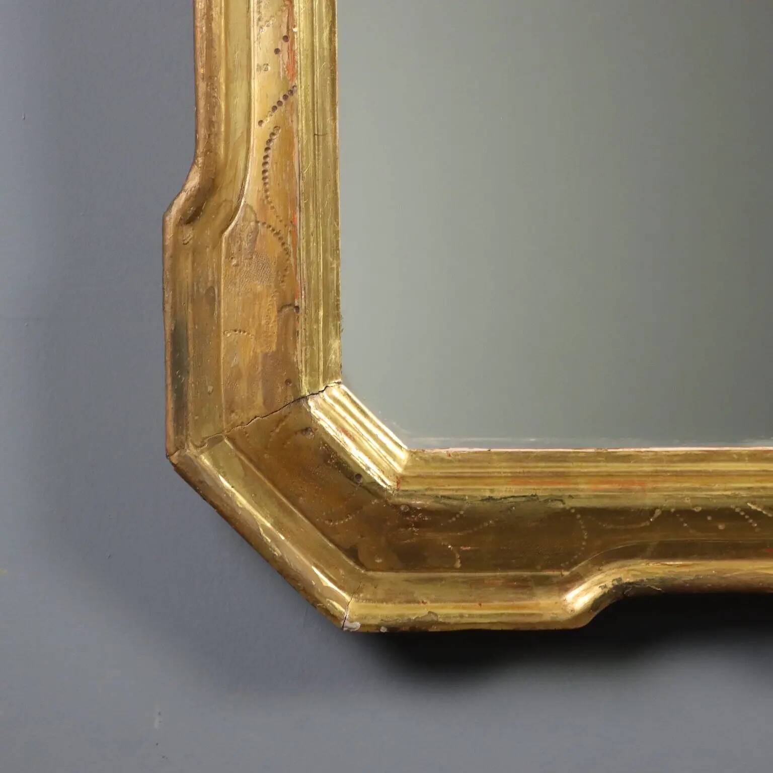 Antique cabaret mirror in gilded wood, Italy, mid-19th century.