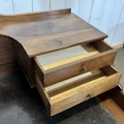 Louis XVI style desk from the late 19th century in walnut with a leather top.