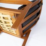 Easy chair with stool in teak upholstered with black leather design Arne Wahl Iversen