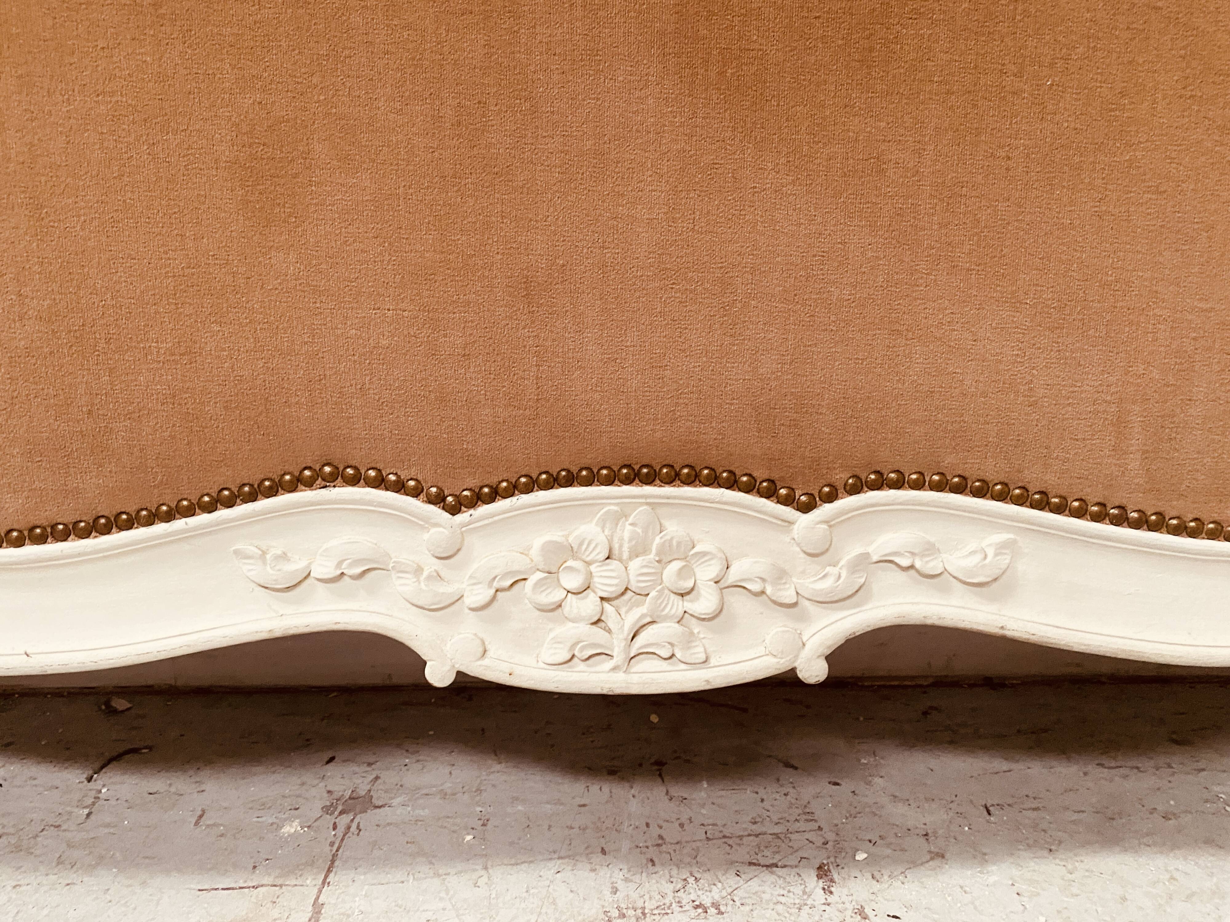 Louis XV style bed in patinated hornbeam, 20th century.