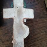 Child on the polychrome plaster cross