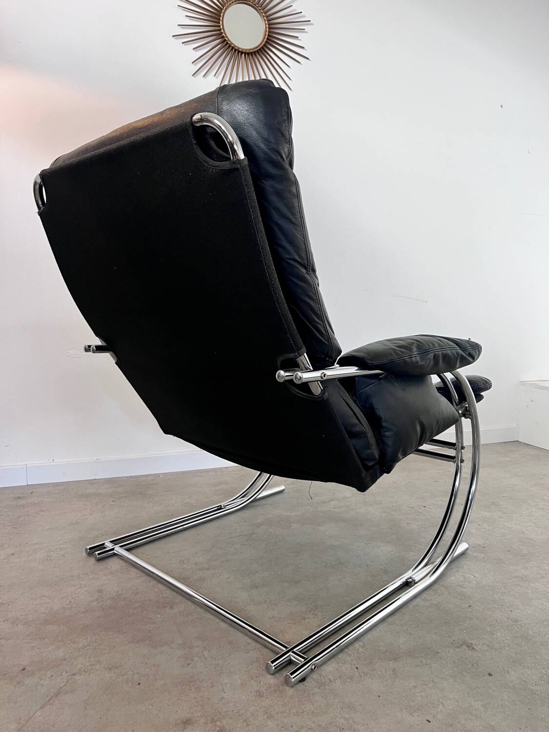 Old armchair and ottoman black leather tubular chrome bauhaus design from the 70s