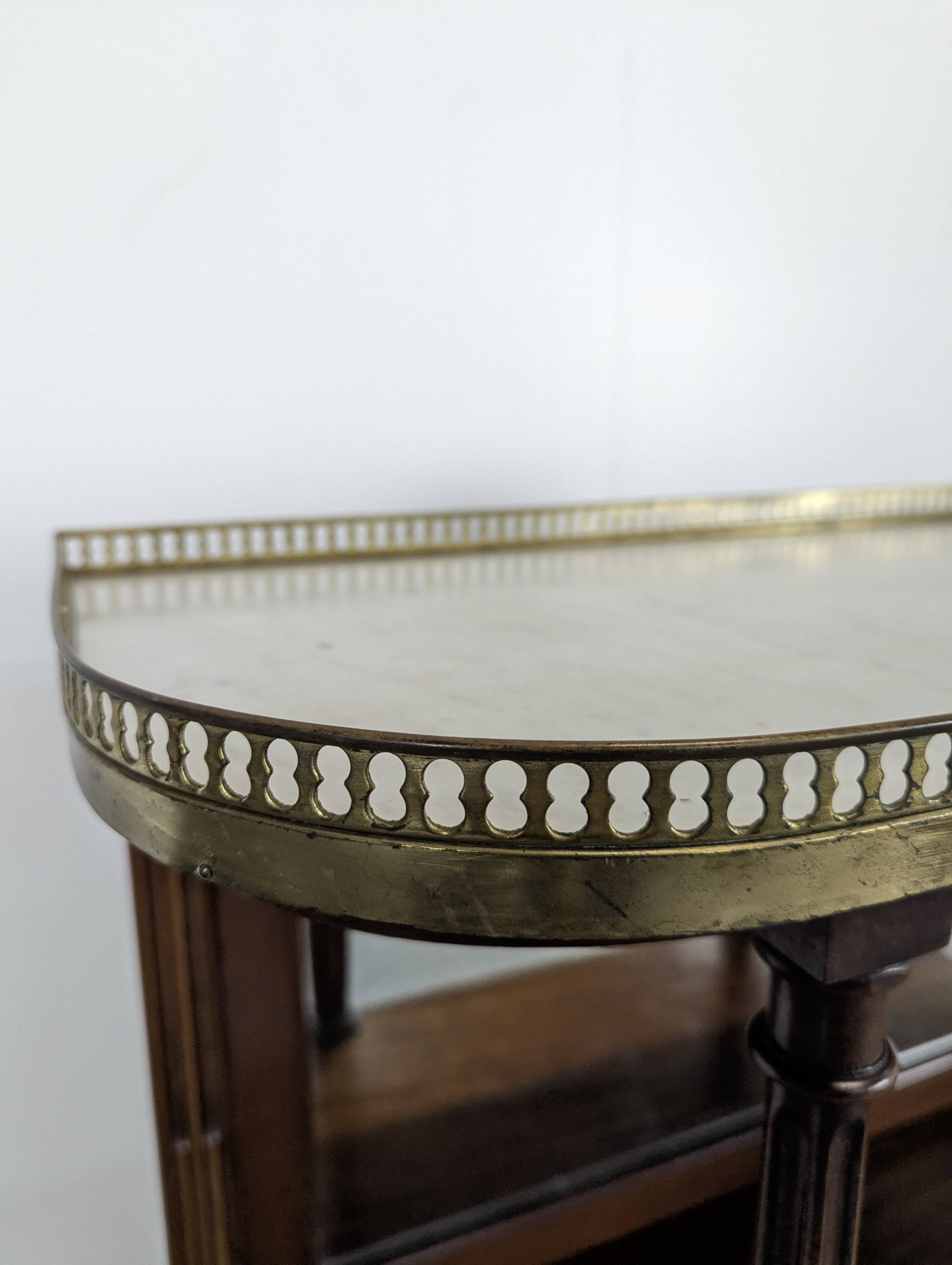19th-century bar in Louis XVI style made of mahogany.