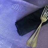 Old damask tablecloth in linen and iris silk
