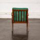 Boomerang chair in green fabric