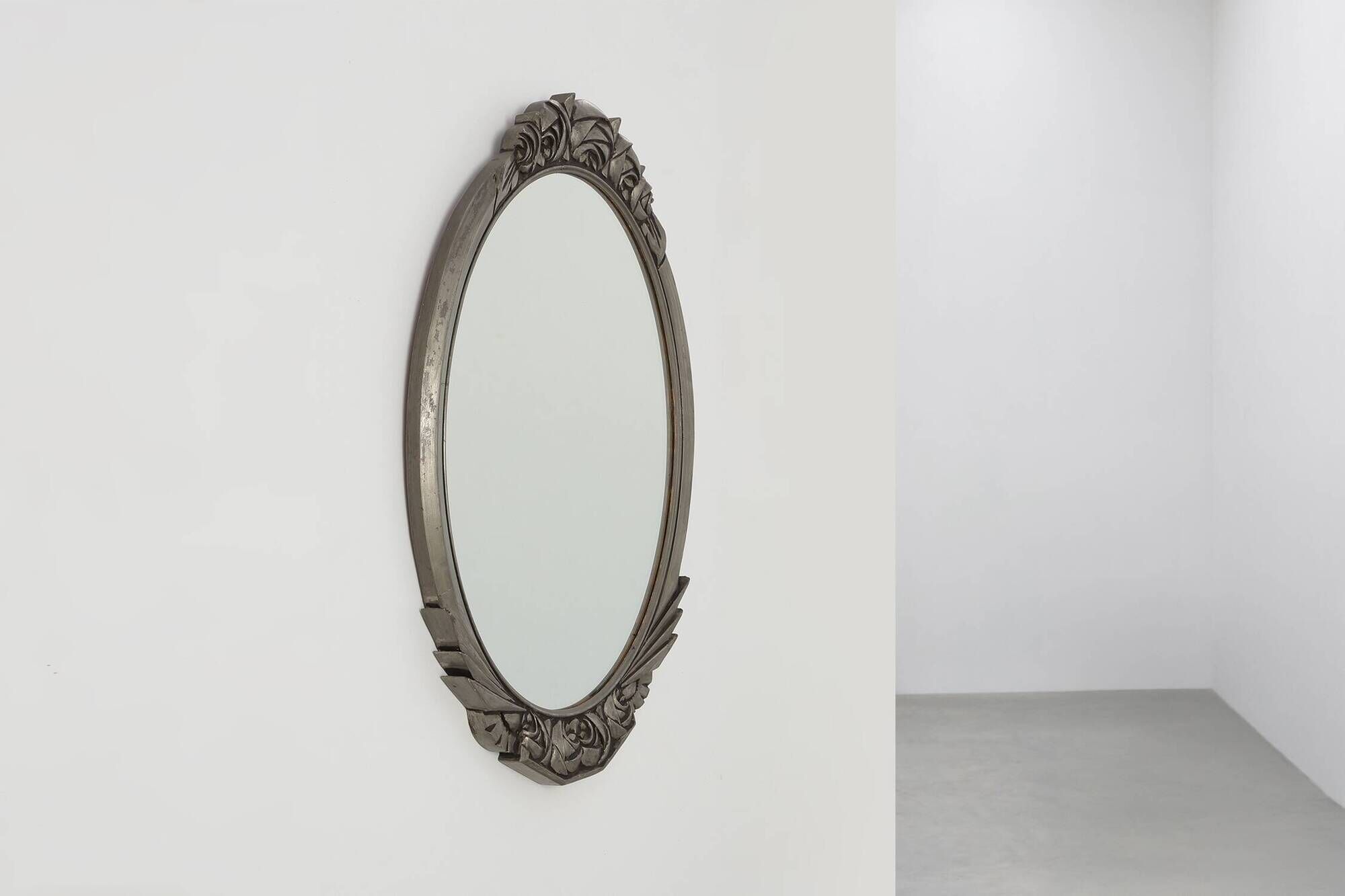 French Art Deco Oval Mirror with Carved Roses and Silver-Painted Frame