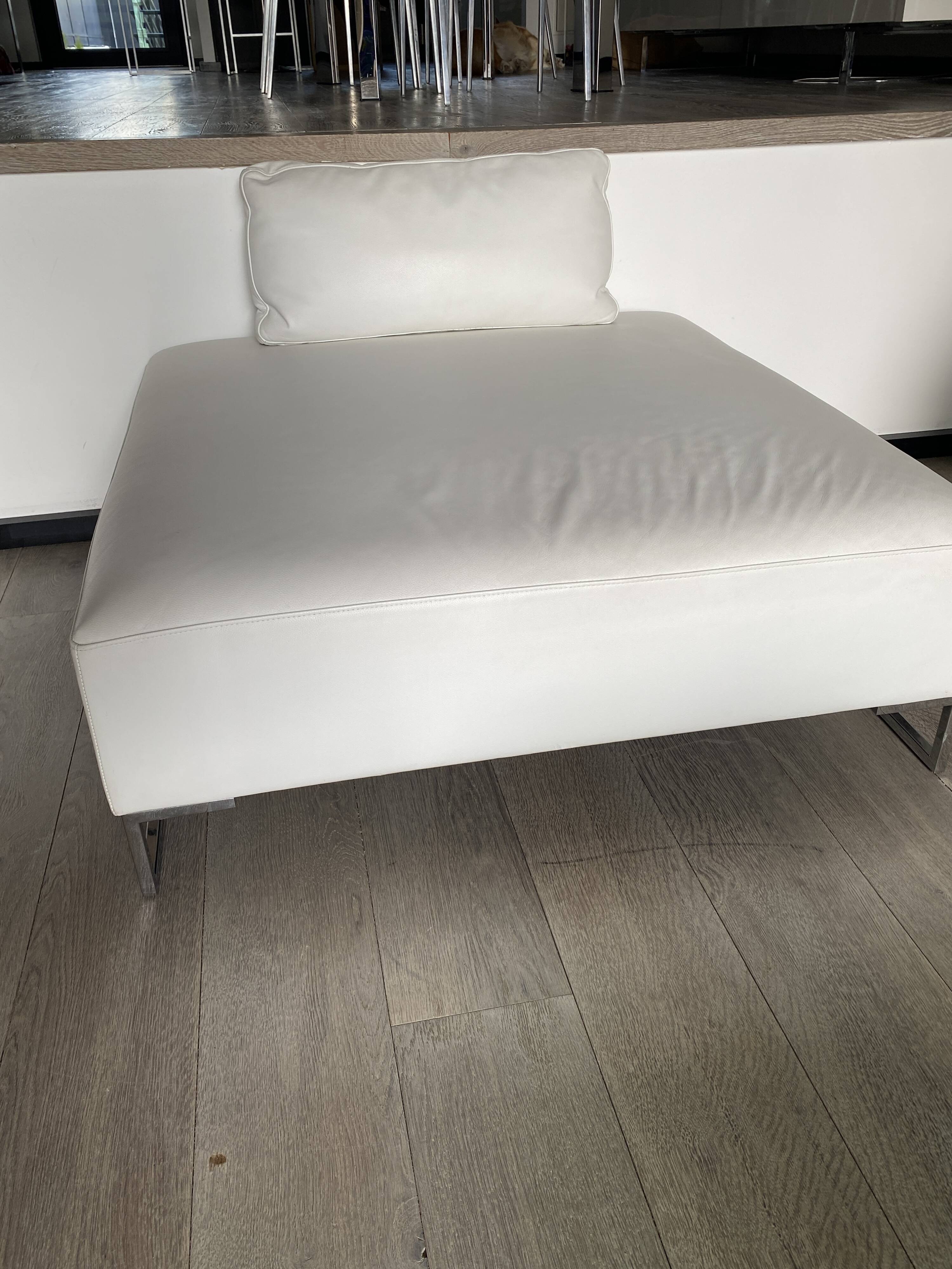 White leather pouf matching Ligne Roset sofa
