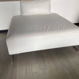 White leather pouf matching Ligne Roset sofa