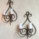 Old pair of wrought iron wall lights