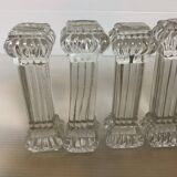 Ten old molded glass knife holders
