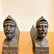 Pair of antique cast iron fire dogs