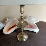 Oriental candlestick in gilded bronze