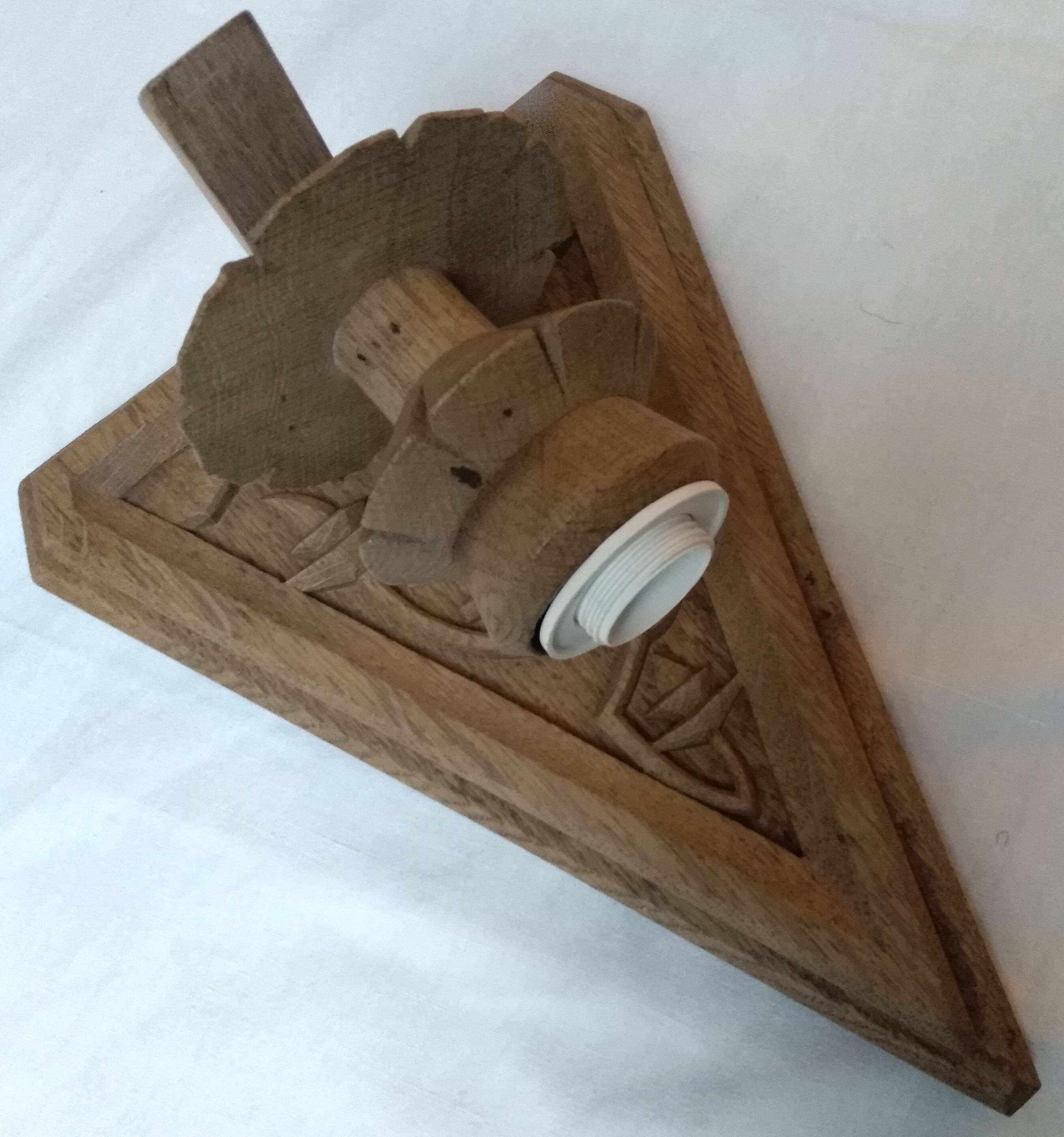 Old hand-carved wooden wall light