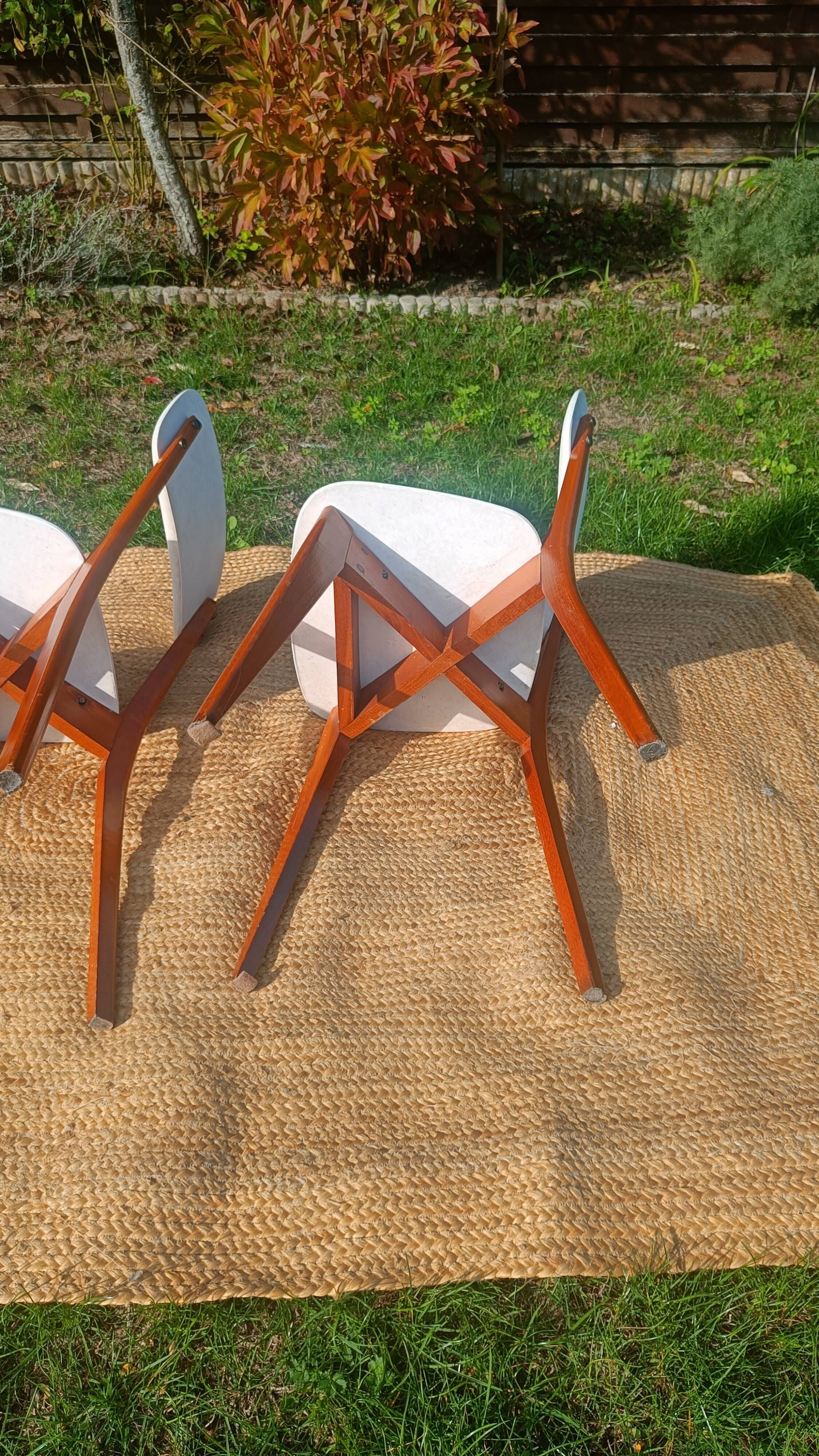 vintage wooden chairs with white faux leather