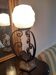 Art Deco period lamp wrought iron and pressed molded glass globe