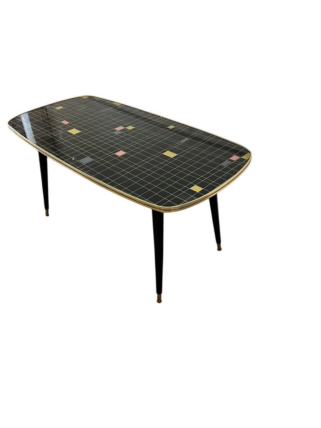 Table basse vintage en formica noir et or