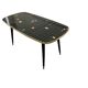 Table basse vintage en formica noir et or
