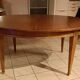 Extendable dining table in Empire style