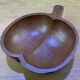 Wooden apple-shaped fruit bowl