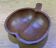 Wooden apple-shaped fruit bowl
