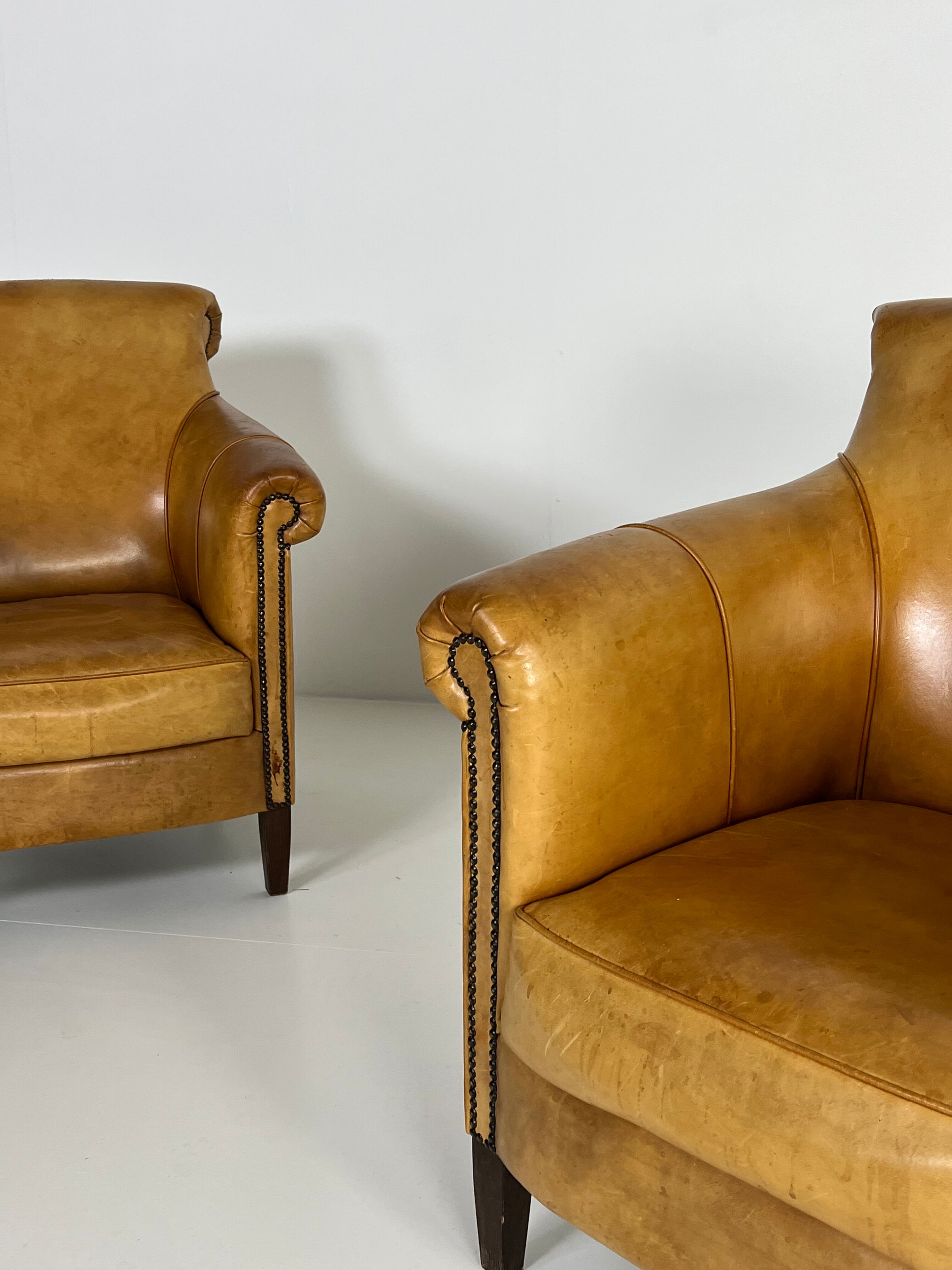 Ensemble de 2 fauteuils club en cuir