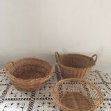 Three natural wicker baskets