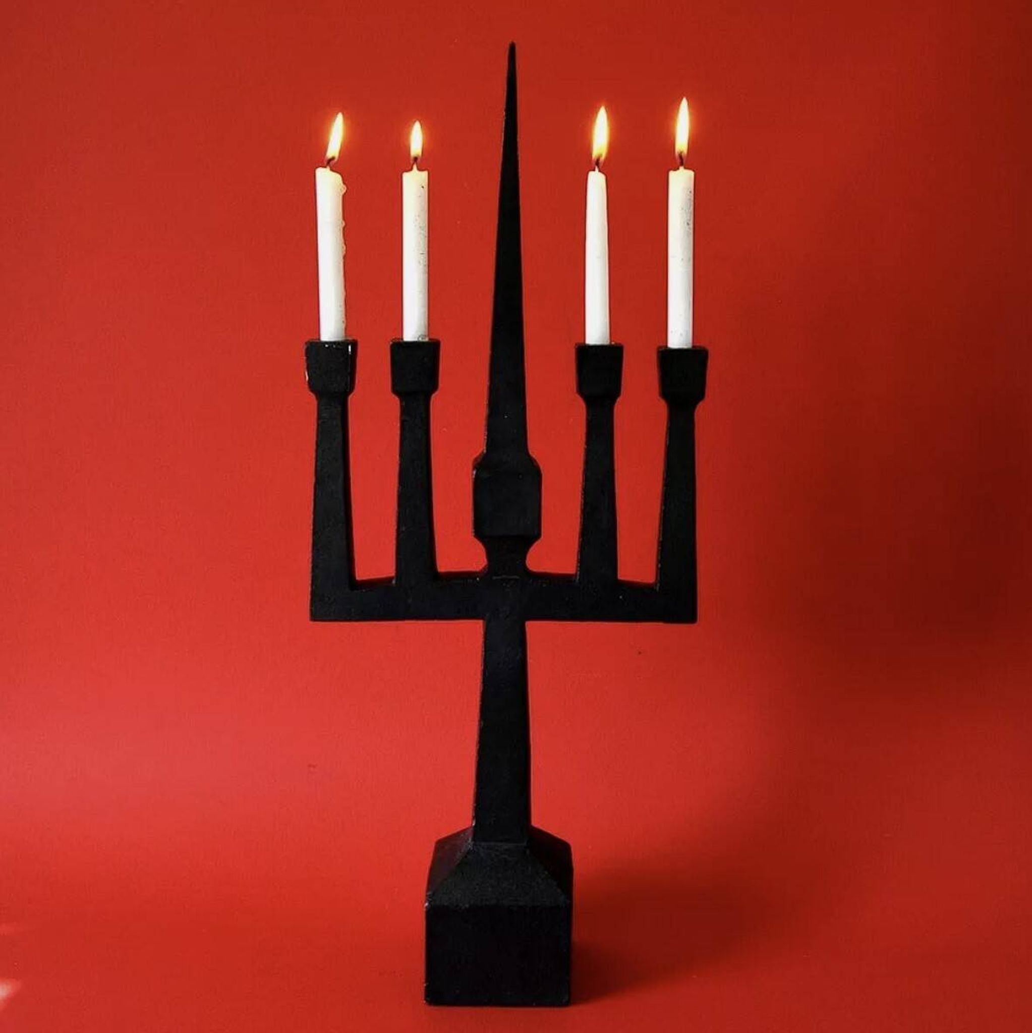 Brutalist candelabra in black forged steel 1950