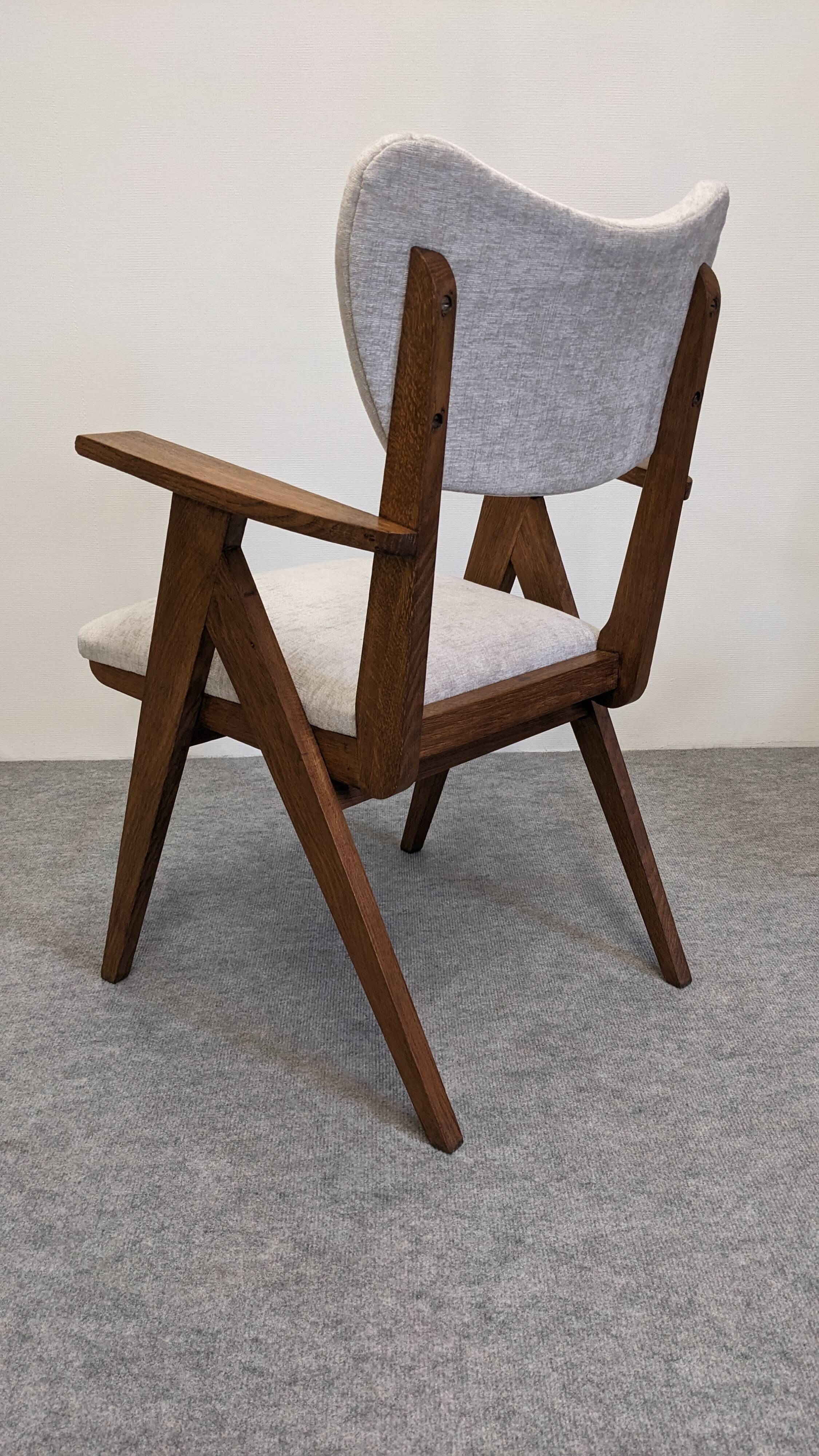 Pair of Scandinavian bridge armchairs in teak, Denmark circa 1950.