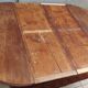 English oval table with 19th century mahogany extensions