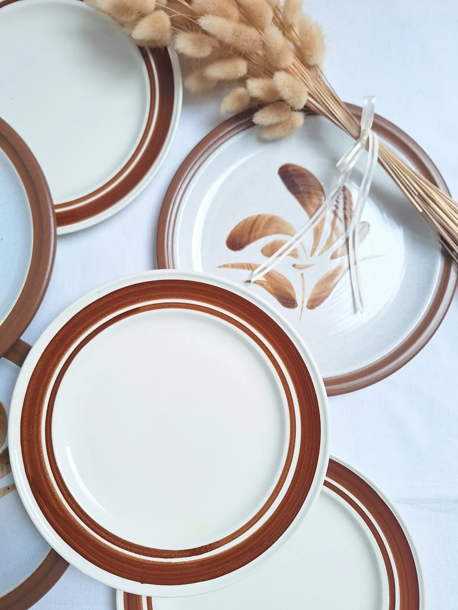 Brown flower-patterned plates from the 1970s.