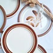 Brown flower-patterned plates from the 1970s.