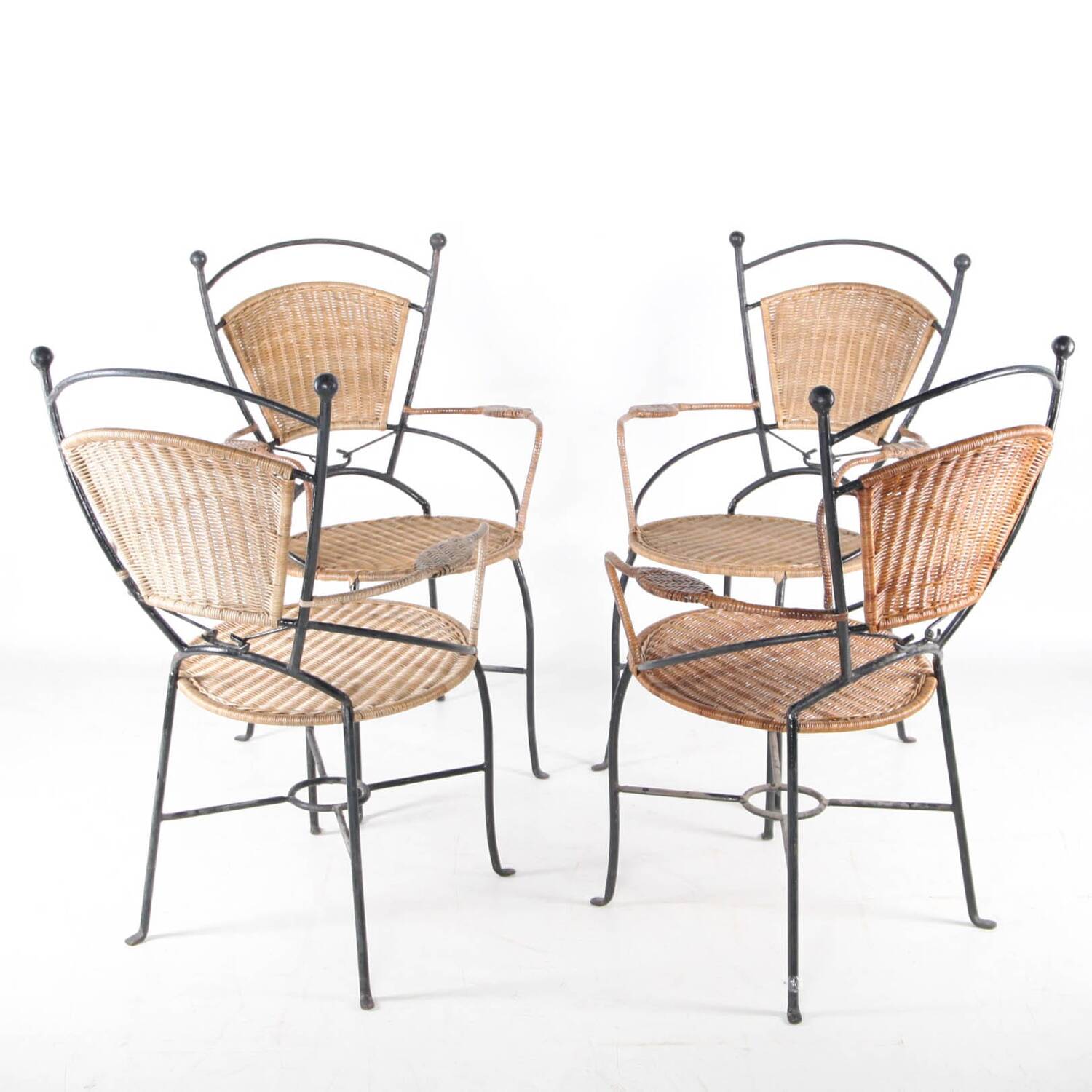 Paire de fauteuils en fer et rotin