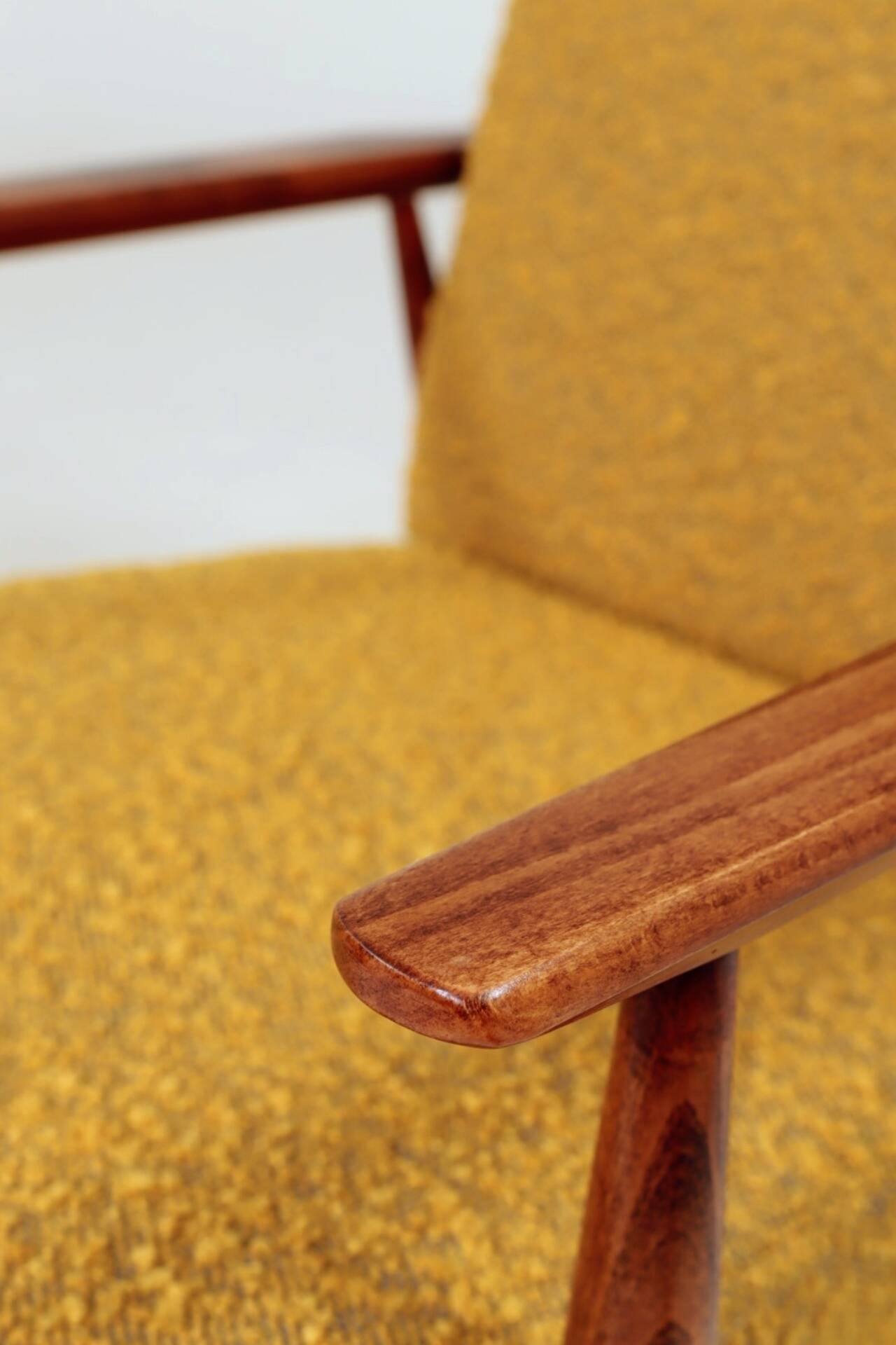 Pair of vintage boucle mustard armchairs H.Lis