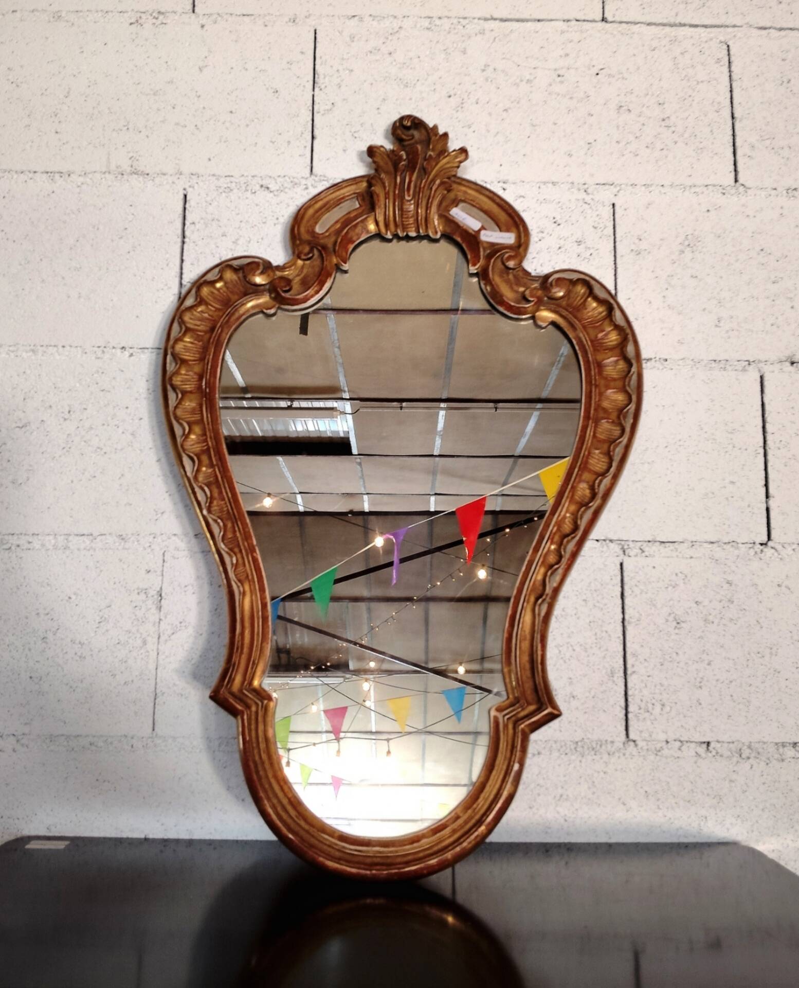 Rococo Style Mirror in Gilded Wood with Sculpted Pediment