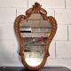 Rococo Style Mirror in Gilded Wood with Sculpted Pediment