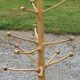 Brutalist coat rack on boxwood stand