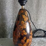 Lampe en bois sculpté motif floral