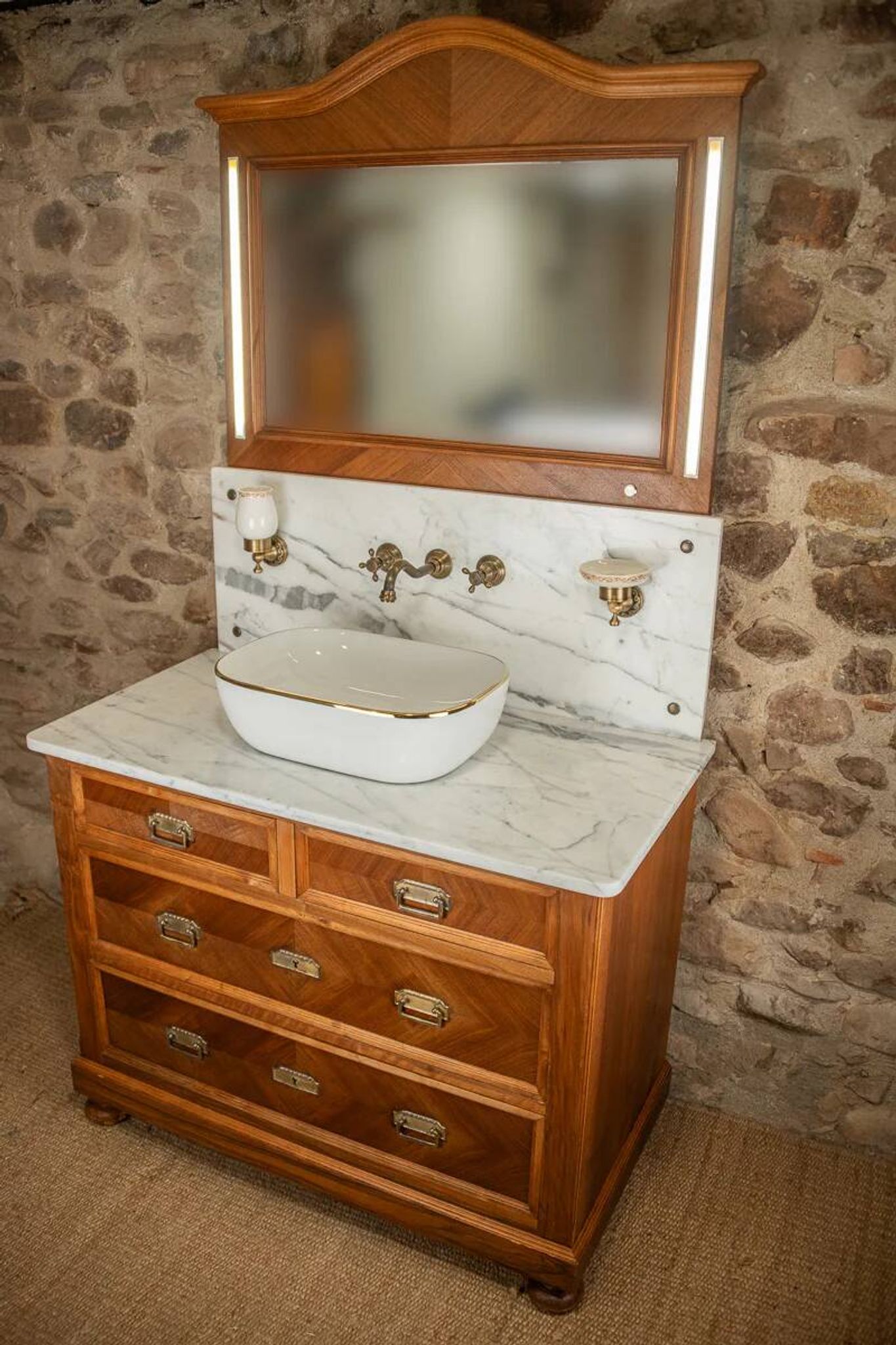 Antique washbasin cabinet from 1928 in wood and marble with illuminating mirror.