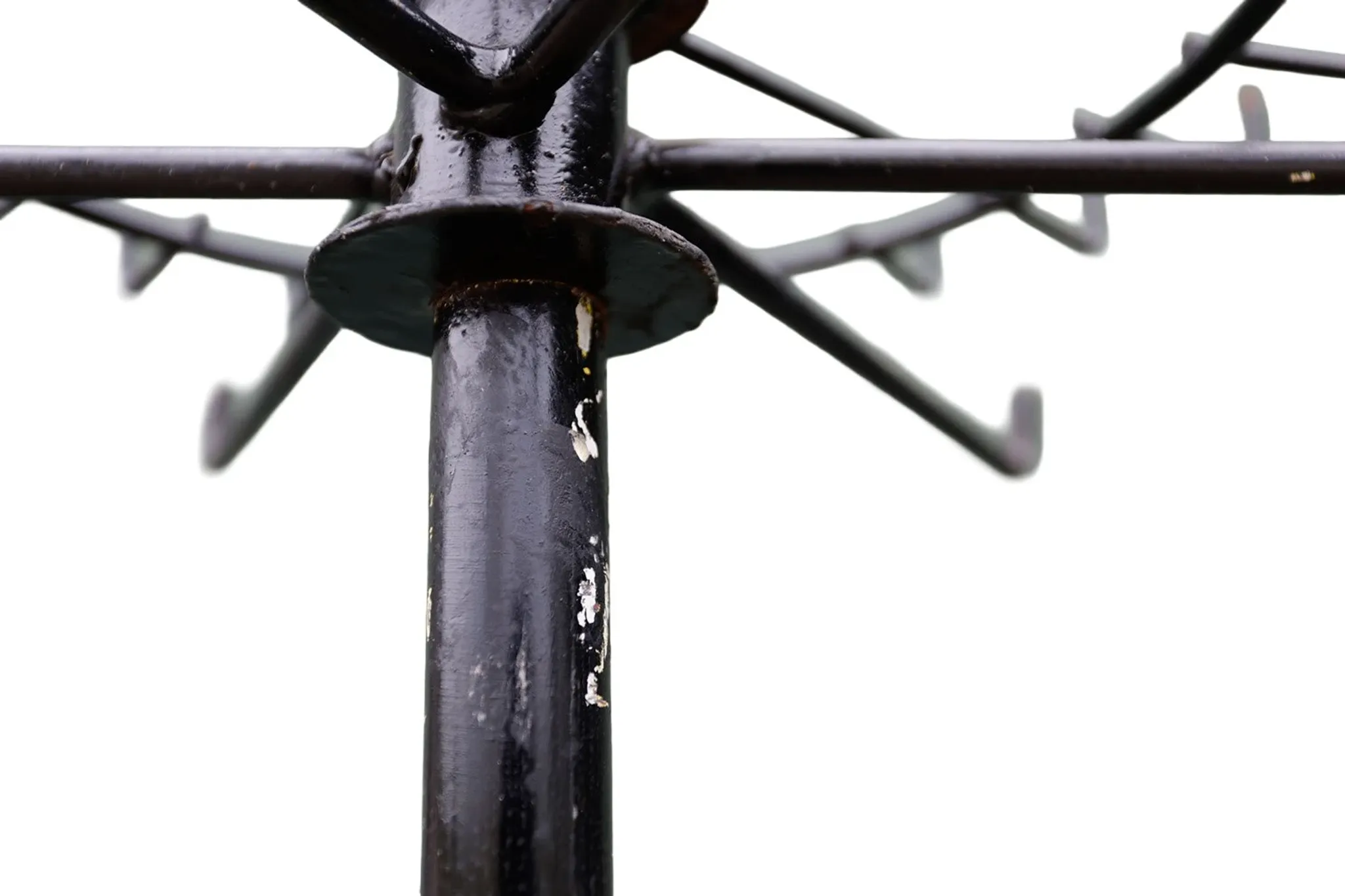 Sculptural vintage metal coat stand with rotating crown