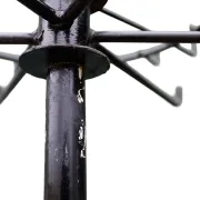 Sculptural vintage metal coat stand with rotating crown