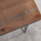 Solid wood console on black pins