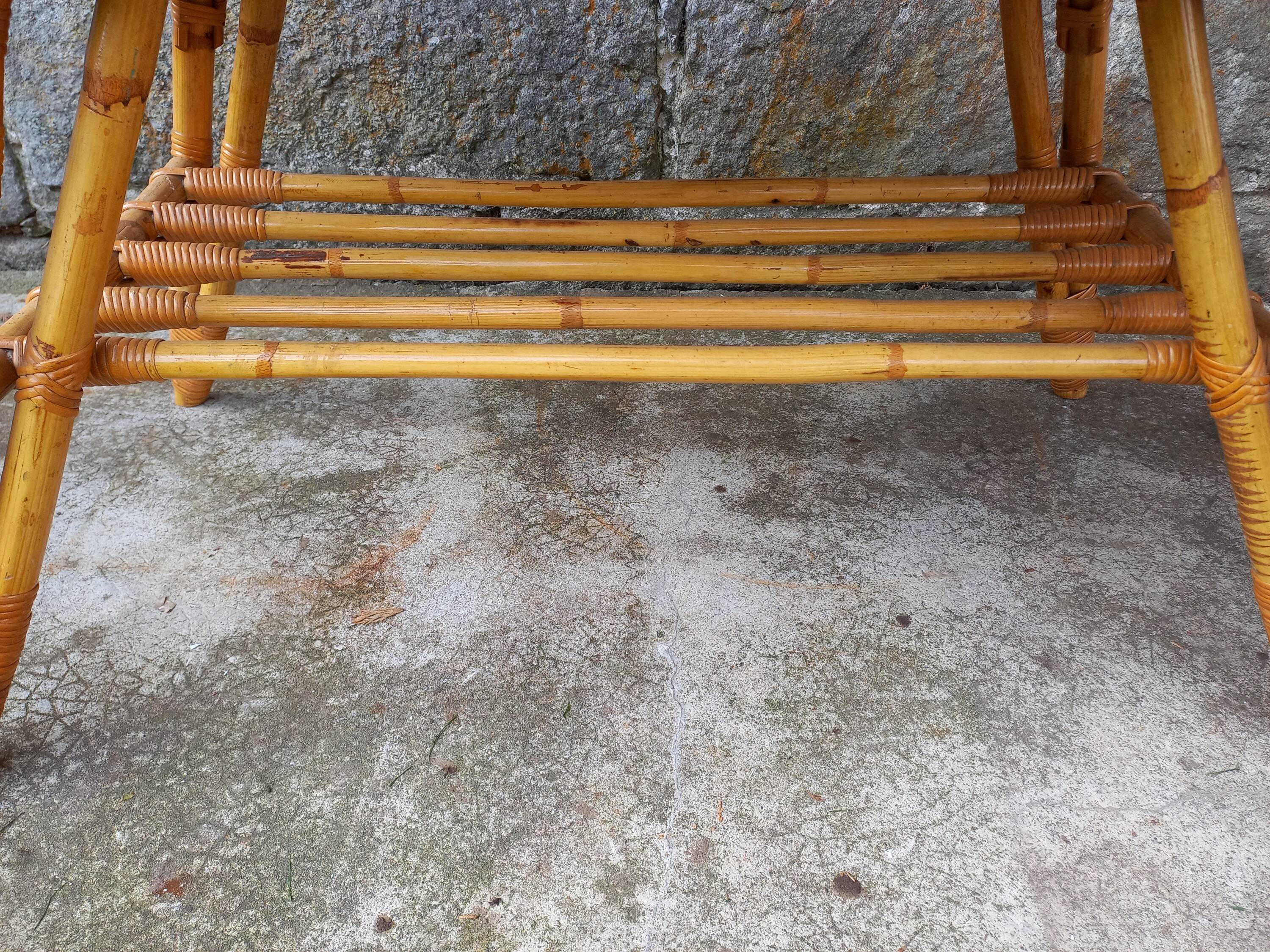 Rattan coffee table with compass legs